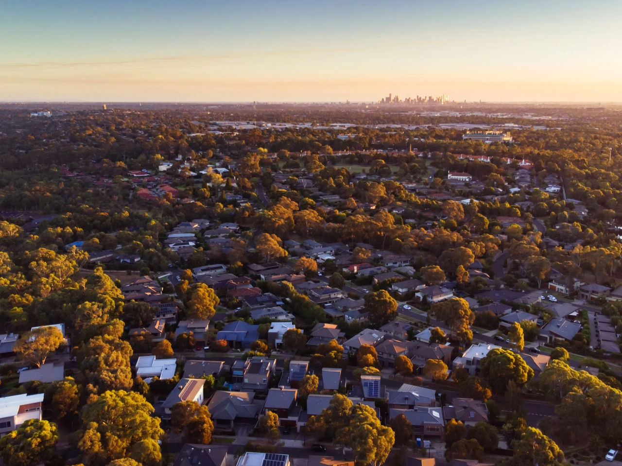 Aerial view of residential houses and Melbourne CBD