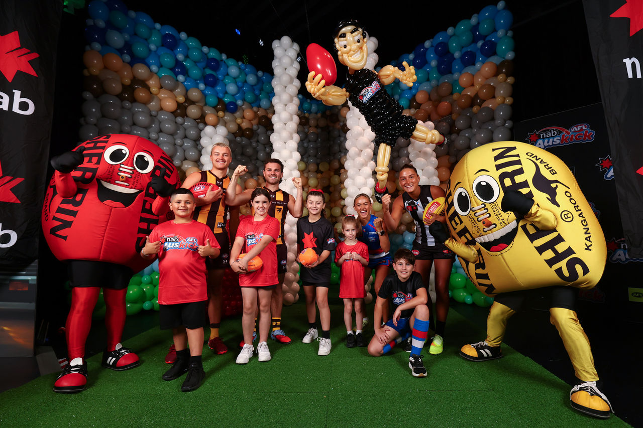 MELBOURNE, AUSTRALIA - FEBRUARY 17: Jack Ginnivan of the Hawks, Nick Watson of the Hawks, Jasmyn Smith of the Bulldogs and Ash Centra of the Magpies during the 2026 NAB AFL Auskick Launch at Balloon Story, Melbourne Convention and Exhibition Centre, on February 17, 2026 in Melbourne, Australia. (Photo by Josh Chadwick/AFL Photos)