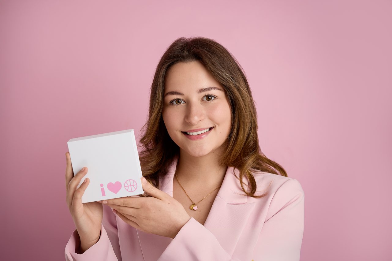 image of girl in pink suit 
