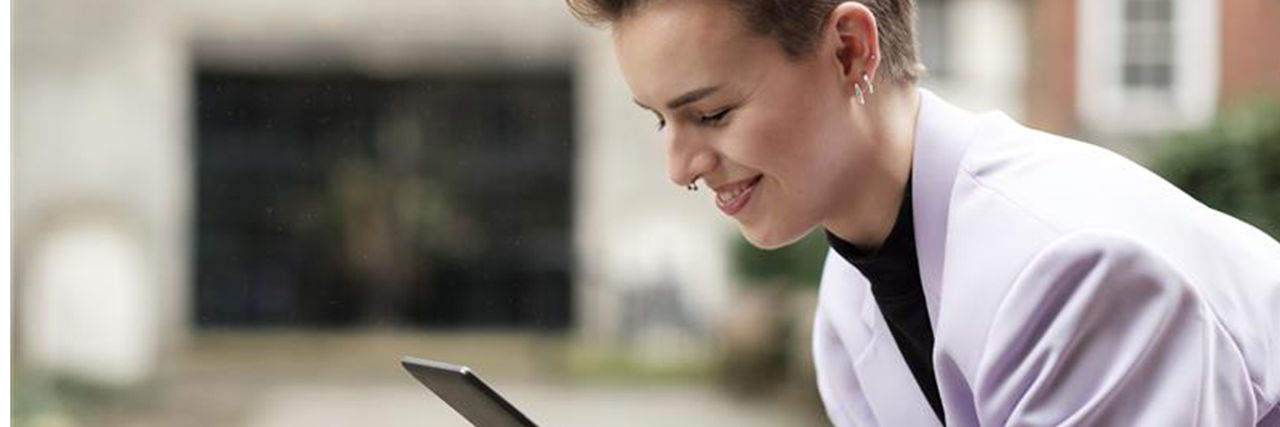 Gen Z woman on device