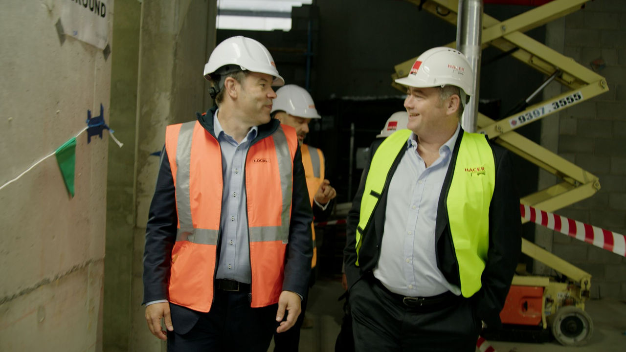 Andrew Irvine, NAB CEO at construction site wearing a his vis jacket
