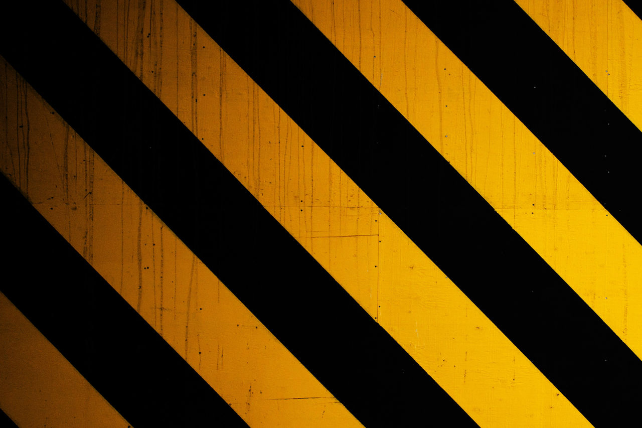 yellow and black stripe warning background