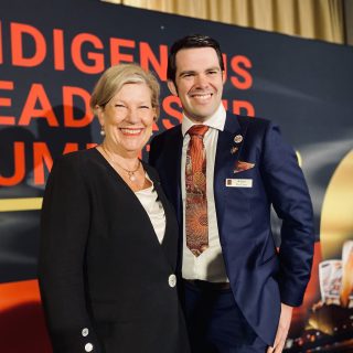 NAB Non-Executive Director, Ann Sherry with NAB banker both smiling