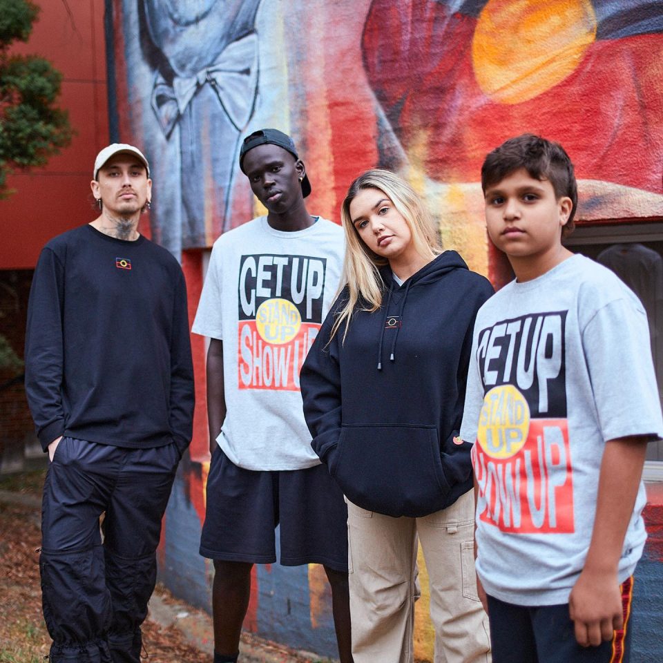 Four young people wearing Clothing The Gaps merchandise