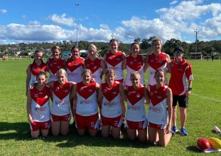 Sophie and her AFL team, the Eden Whalers.