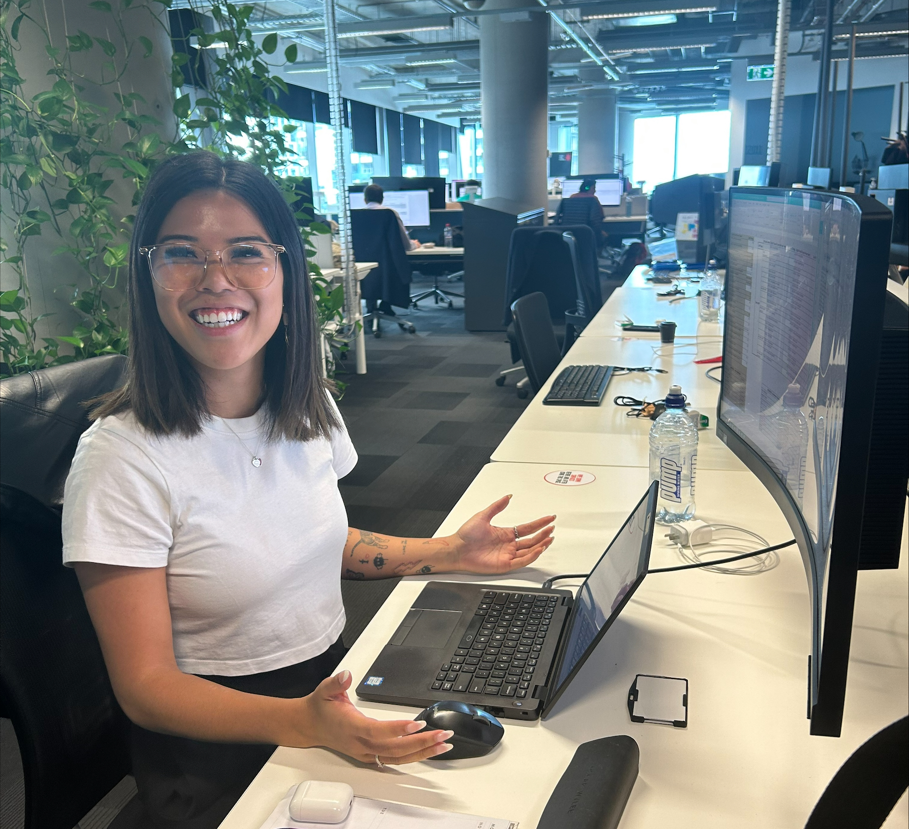 NAB colleague Jenny Pham at her computer