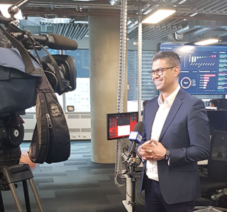 A man, Sandro Bucchianeri, being filmed by a TV crew in NAB's Fusion Centre