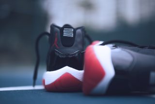 Image of black, red and white Nike runners