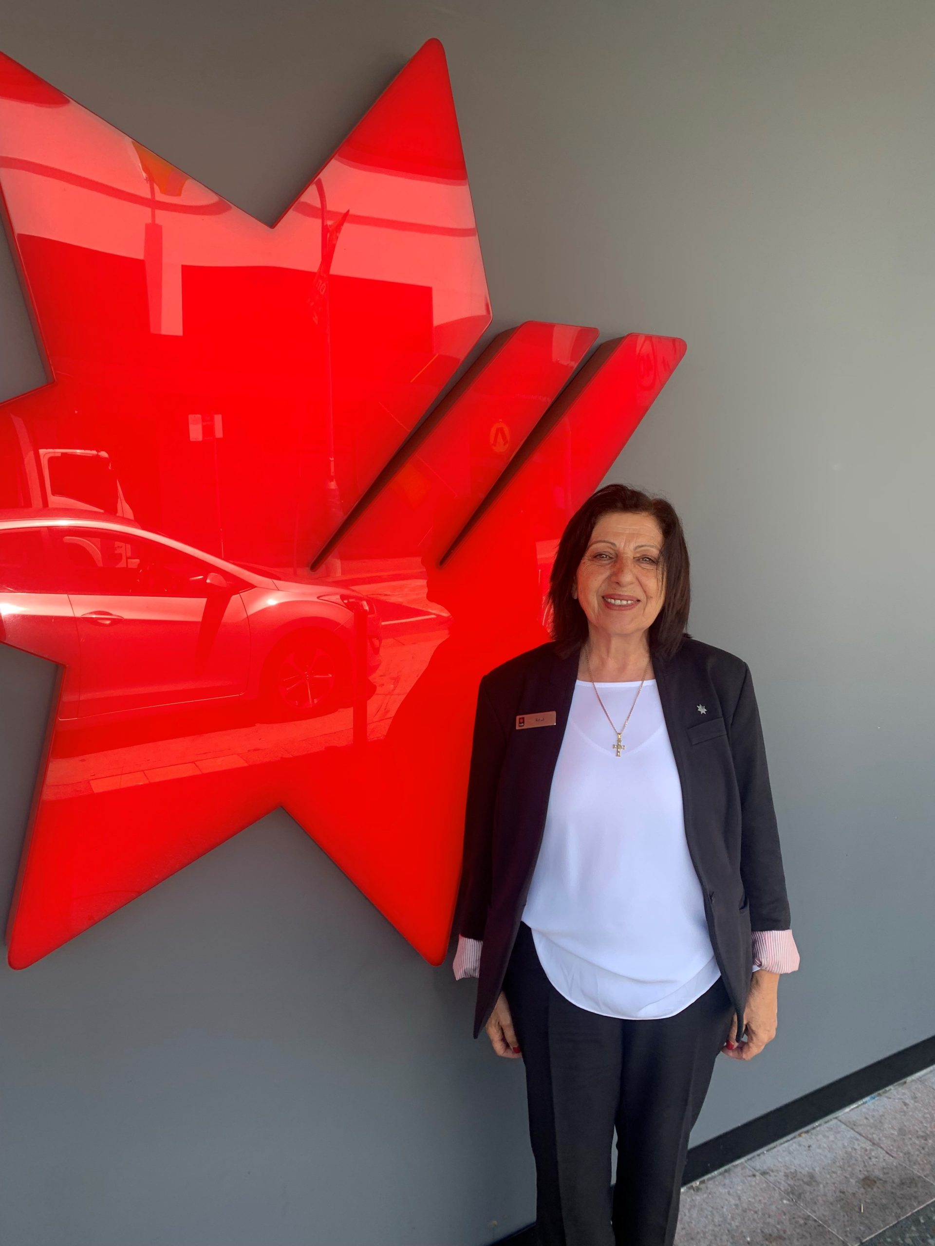 NAB banker Rosa stands outside the Hurstville branch