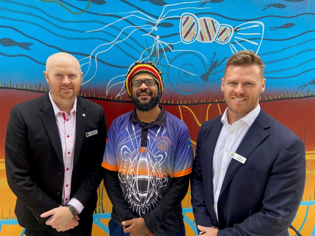 Toowoomba branch manager, Steven Platen, local artist David McCarthy and NAB Retail Executive Queensland, Chris Francis standing side-by-side in front of the mural